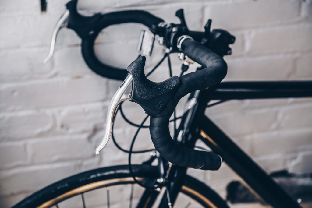 Close up view of a road bike's handlebars and brake levers